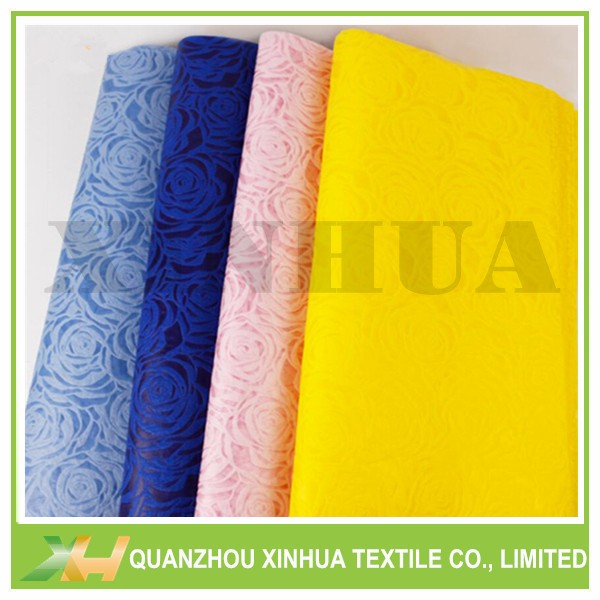 Wholesale newly embossed pattern rose nonwoven flower fabric